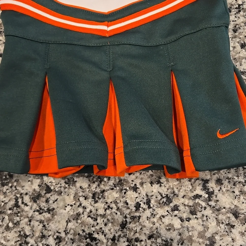 NIKE MIAMI HURRICANES CHEERLEADER DRESS. SIZE 18 MONTHS.